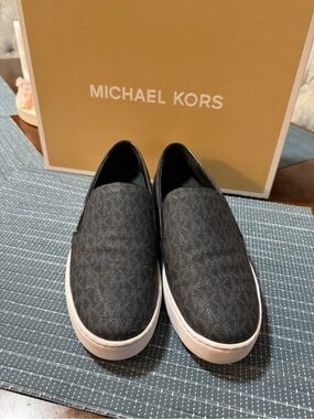 Michael Kors Black Logo Slip-On Sneakers with White Soles
